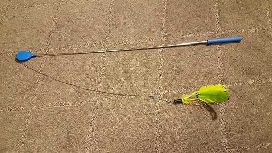 the air wand fully extended with the string all the way out